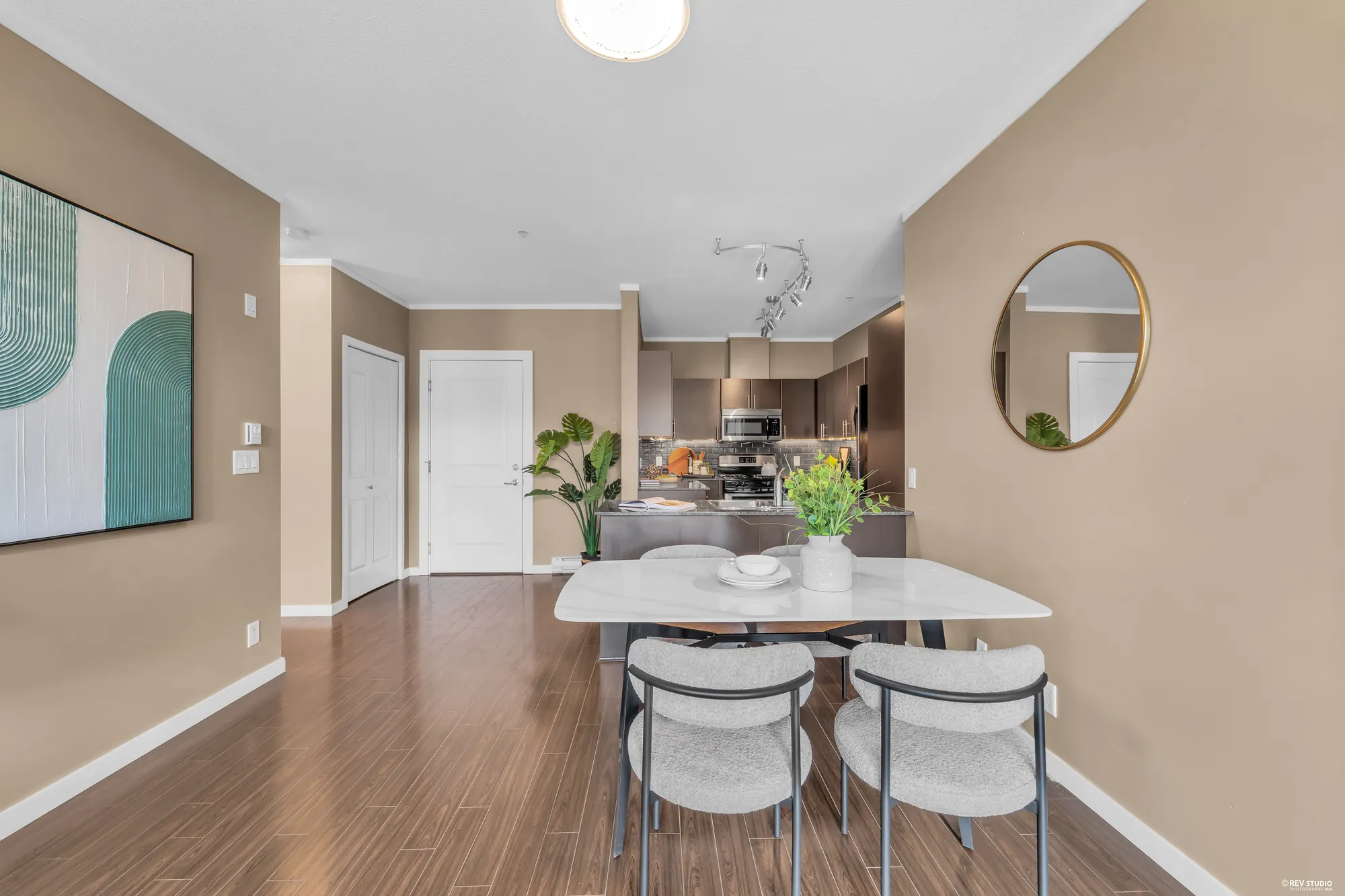 The dining area with the kitchen counter behind it