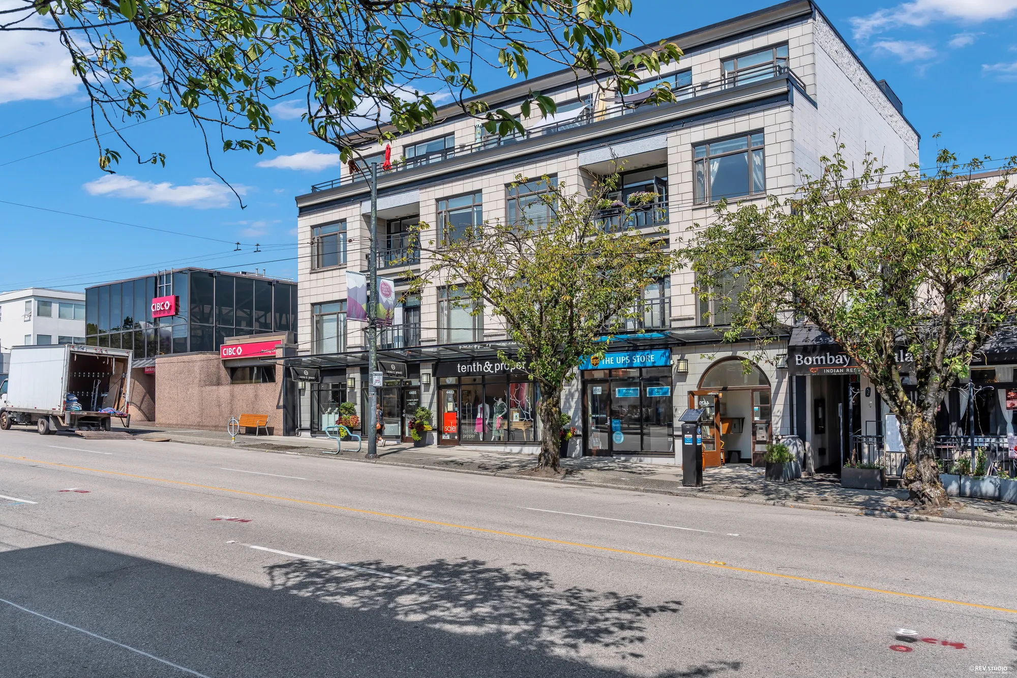 The building from across West 10th Avenue, seen along the block